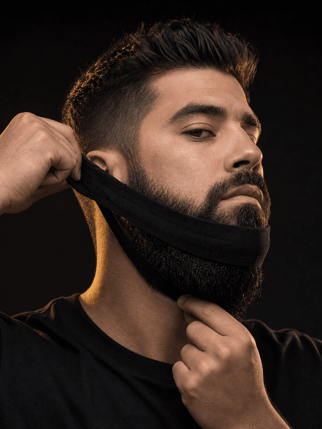 Professional model placing the BeardBand around his beard
